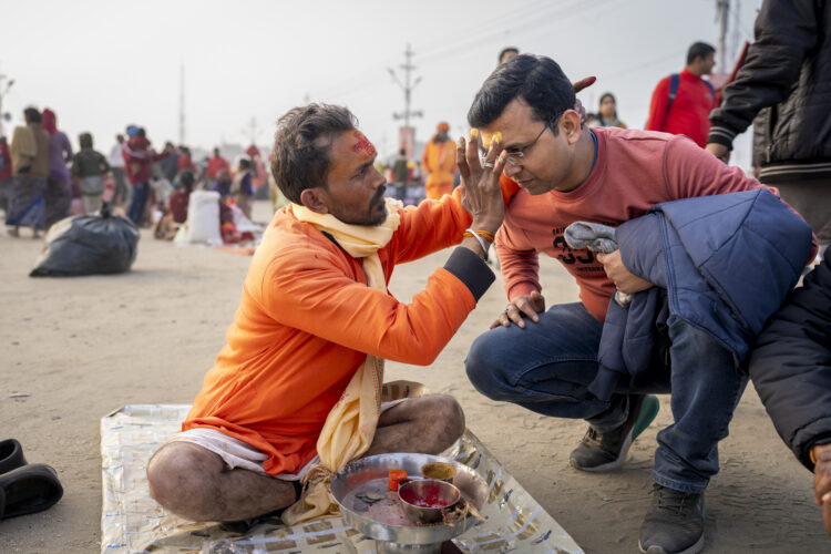 Sacred strokes of color on foreheads are a major display of Hinduism at India’s Maha Kumbh festival